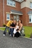 The Rowan family outside their home with Elvis the dog.