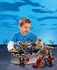 Boy playing with Playmobil