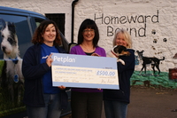 Petplan's Carol Jones, with Dumfries & Galloway Canine Rescue Centre staff