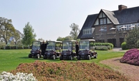 Estates manager Peter Pattenden and golf business manager Karen Proctor with four of the new fleet of buggies