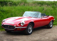 Classic E-type pips ex-Chris Evans Ferrari to be first past the post