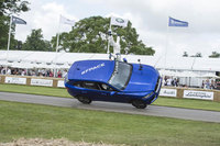 Jaguar F-Pace thrills Goodwood with dramatic two-wheeled ride