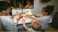 Kids washing hands