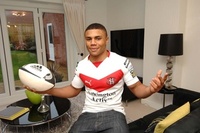 David Wilson scores with St Helen's rugby star 
