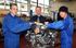 Head of Motor Vehicle, Shrewsbury College, Stuart Thomas pictured with students left, Chris Mellings and Anthony Rowe.