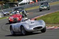 Stirling wins at Spa in his own car