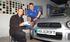 Andy Payne, left, receives his Catalunya Rally tickets from Holdcroft Dealer Principal Dave Brennan