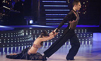 Louisa Lytton and Vincent Simone flying the UK flag