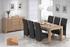 Liven up your home with Delta, an oak table with six chairs in brown leather. Was Â£1995 now Â£995