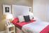 A bedroom at The Belvederes