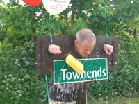 Chief exec puts himself in the stocks for charity