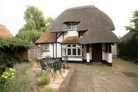The ideal thatched cottage in quiet, English village setting