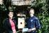 Diana Newman of Persimmon Homes and John-Michael Kennaway owner of Escot Country Park and Gardens with the Persimmon red squirrel nest box.