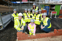 Primary school kids try bricklaying with Barratt