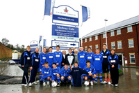 Showing their team colours