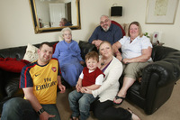 Extended family move into their new home