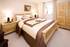 An interior shot of the bedroom at the Cooper Court show apartment