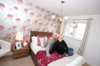Newlyweds say ‘I do’ to their first family home