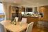 The kitchen and dining area in a Boardwalk penthouse