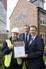 McLaughlin, proudly shows his Seal of Excellence Award to Miller homes MD, Steve Birch and Production Director, Andy Davies.