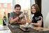Newlyweds Angela and Matthew Riley relax in their new dining room at Kirks Paddock.