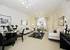 The spacious living/dining area is the perfect spot for relaxing after a hard day's shopping in London or for simply unwinding after work