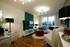 The lounge of a similar style show apartment