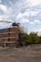 The landmark water tower at the former Charnos factory crumbles and crashes to the ground