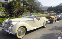 Classic cars cruise through Le Meridien Al Aqah