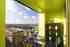 Apartments in The Lemonade Building include balconies with panoramic views.
