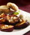 Roasted brown sugar plums with Amaretto whipped cream 