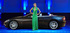 Jodie Kidd wearing Damiani jewels poses with the new Maserati GranCabrio