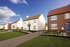 A street scene of the detached homes available from Redrow at The Glades.