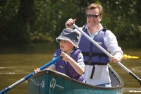 Father and son canoeing on the River Thames