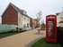 Approach to the show homes, complete with red telephone box.