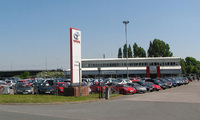 Cleaner cars from greener showrooms