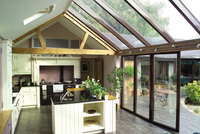 Lighting up your kitchen with folding sliding doors
