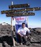 Ben Cooper at the summit of Mount Kilimanjaro