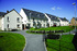 A street scene of homes from Redrow @ The Grange