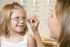 Optician with child