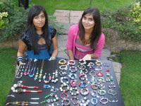 Safina and Zainab with some of their work.