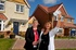 Kirsten Lewis claims her prize from Redrow sales consultant Noreen Morton