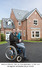 Andy and Claire outside their new home