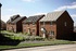 A street scene of homes from Redrow @ The Grange