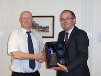 Richard picks up a long service award from Peveril Homes