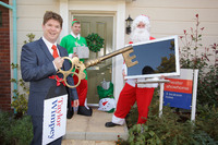 Chris Ashmore of Taylor Wimpey with Santa 