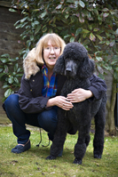 Helen Stone, with pet poodle, George