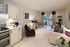 The kitchen and living room at Coach House Court in Wetherby
