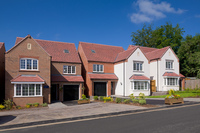 A street scene of Crest Nicholson’s homes at The Pines in Humberstone