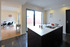 The Rowan open plan kitchen dining leads out on to a decked patio.